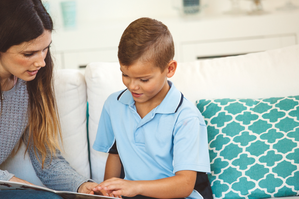 Babysitter helping with homework